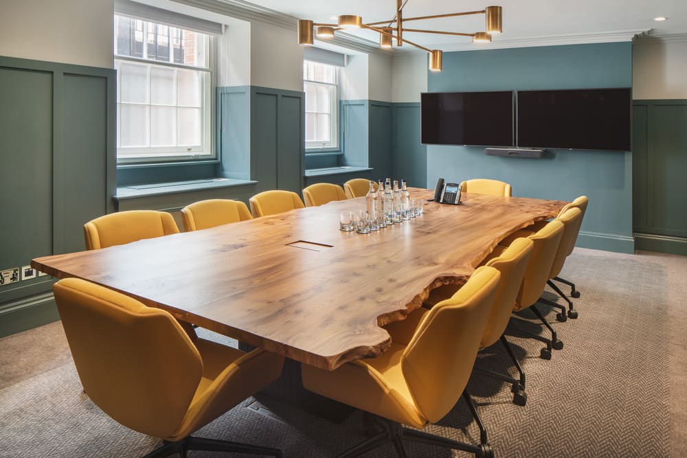 The Mayfair Room meeting room with refreshments and tv