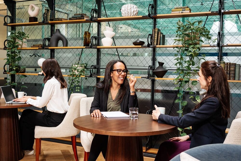 Women Smiling In A Business Meeting (1)