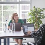 Women Smiling In A Meeting Together (1)